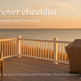 Quiet November bay-side deck on Long Beach Island with stacked chairs and dune grass—post-season reset.