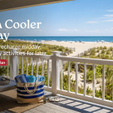 LBI rental porch overlooking beach dunes and the Atlantic Ocean on a hot summer day