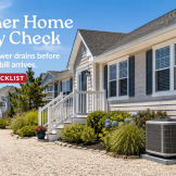 Summer home energy check for a coastal-style LBI Region house with an outdoor air-conditioning unit on a sunny August day