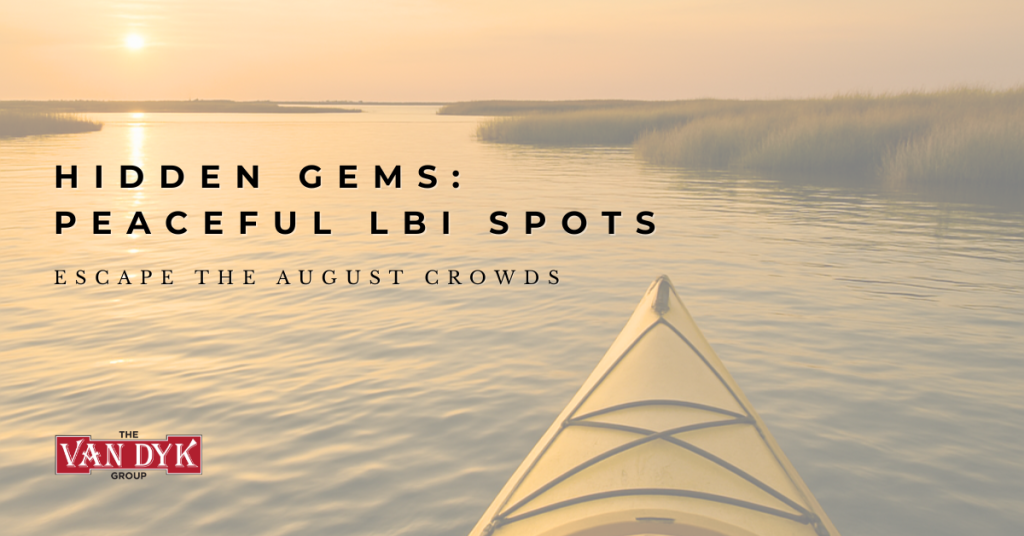 Kayak on calm Barnegat Bay at golden hour with sedge marshes—a tranquil scene highlighting peaceful LBI spots away from crowds.
