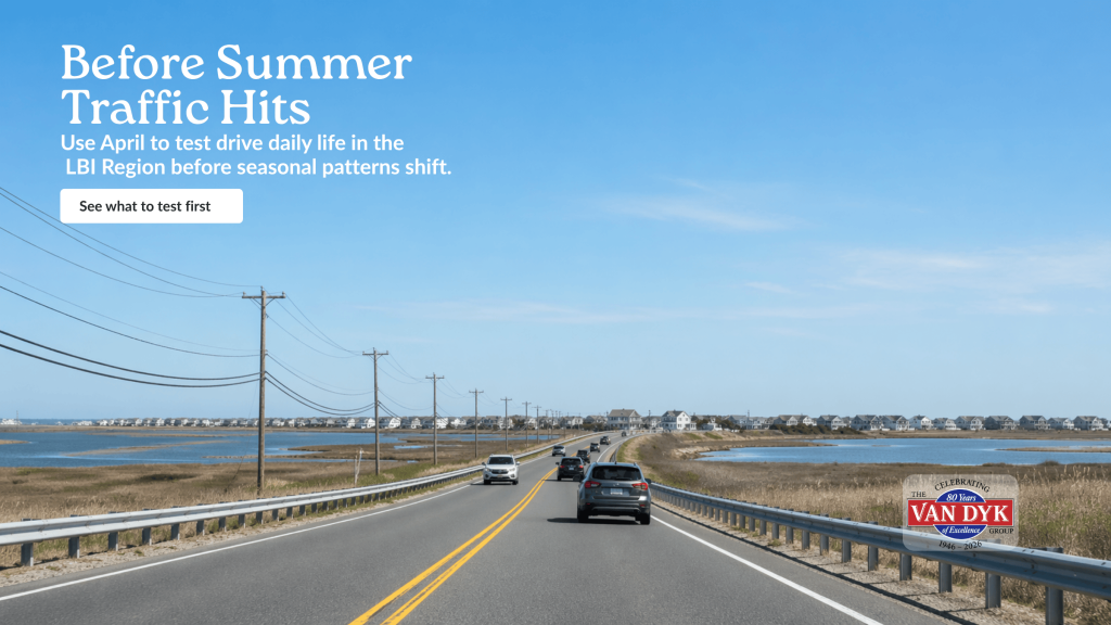 Scenic late-April road approach in the Long Beach Island region, with light traffic, marshland, bay water, and blue sky, illustrating a buyer’s spring test-drive before summer traffic.