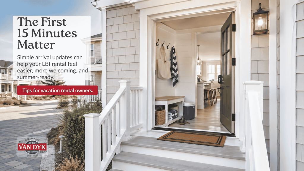 Welcoming entry of an LBI vacation rental with an open door, keypad, porch light, and organized drop zone for arriving guests.