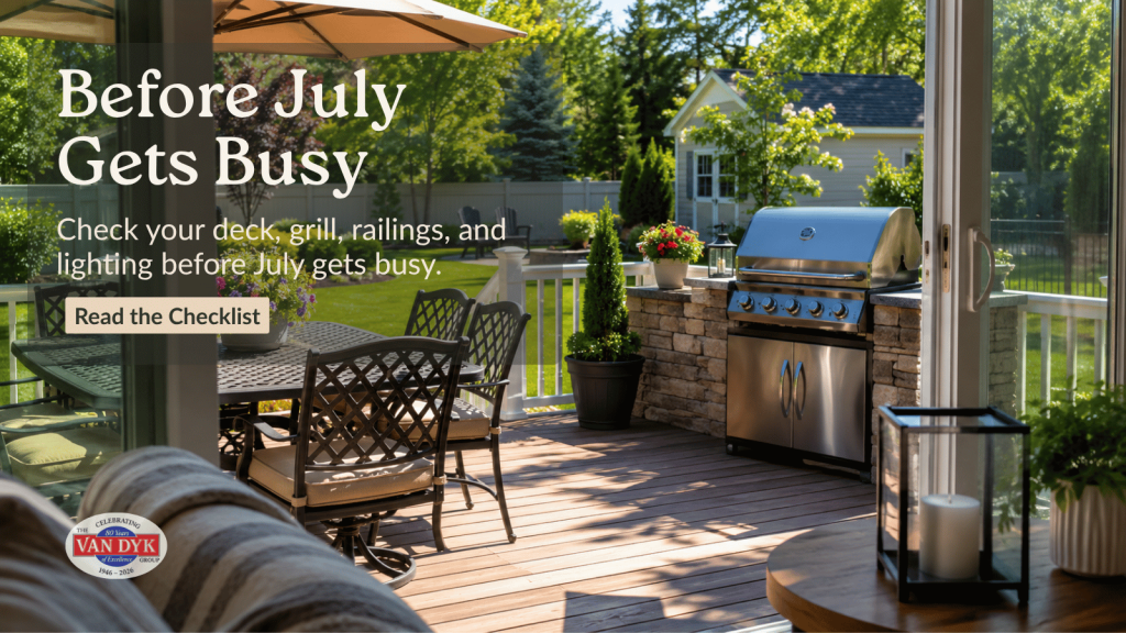 Backyard deck with grill, dining area, and outdoor lighting for a summer safety checklist before July gatherings.