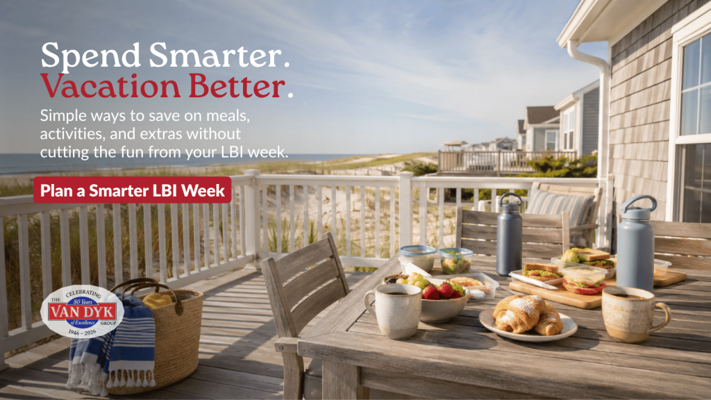 LBI vacation rental deck with a simple breakfast, packed beach lunches, dunes, and an ocean view during an August morning.