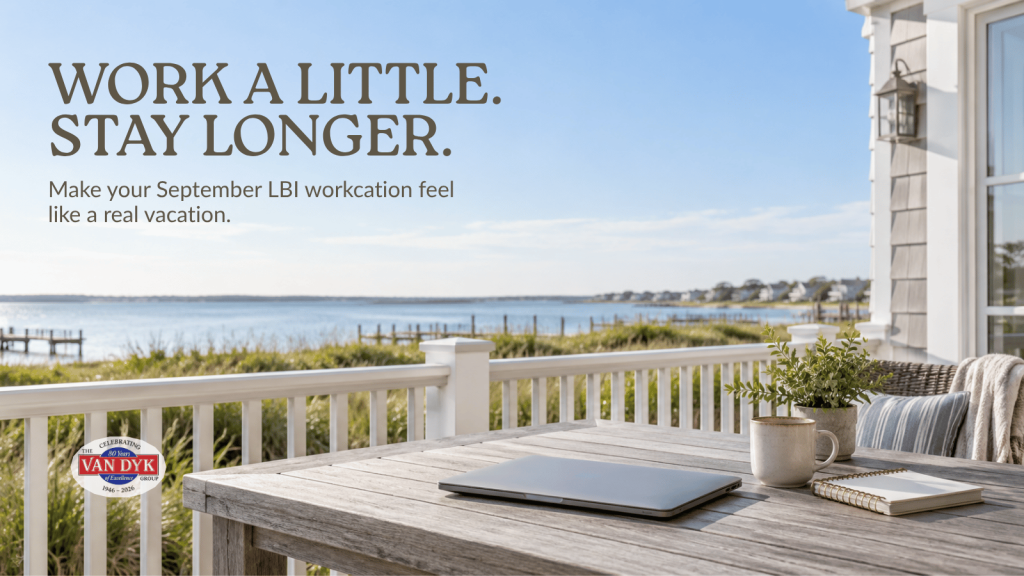September LBI workcation with closed laptop on a coastal deck overlooking the bay